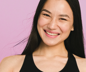 Client smiling after a relaxing Dominical massage